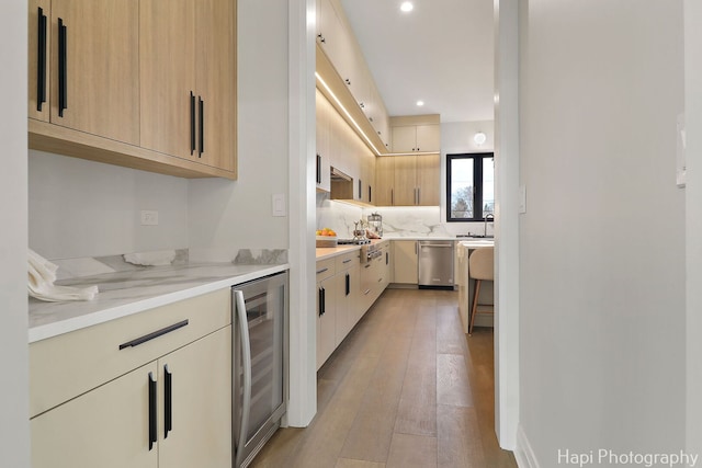 1906 Lee St, Des Plaines, IL 60018 - kitchen with light wood-type flooring, wine cooler, modern cabinets, and stainless steel dishwasher