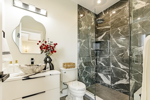 1906 Lee St, Des Plaines, IL 60018 - bathroom with vanity, toilet, and a marble finish shower