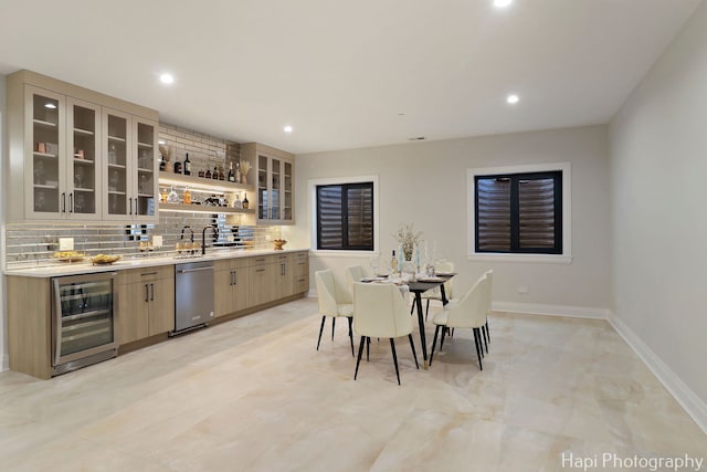 1906 Lee St, Des Plaines, IL 60018 - interior space with recessed lighting, indoor wet bar, wine cooler, marble finish floor, and baseboards