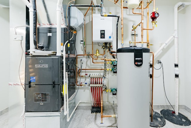 1906 Lee St, Des Plaines, IL 60018 - utility room featuring gas water heater, heating unit, and water heater