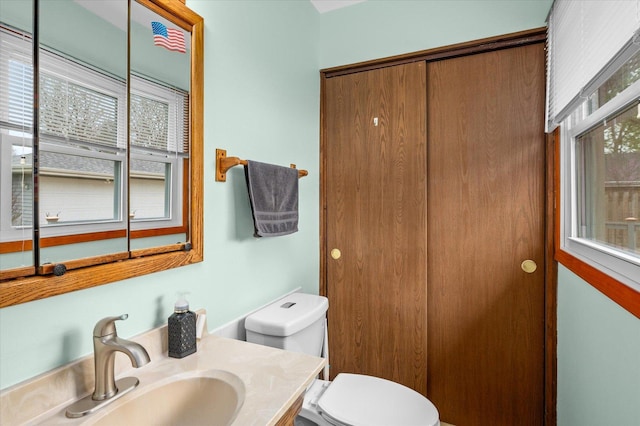 bathroom with vanity and toilet