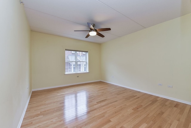 210 N Addison Ave Unit 206, Elmhurst, IL 60126 - empty room with ceiling fan, baseboards, and light wood finished floors