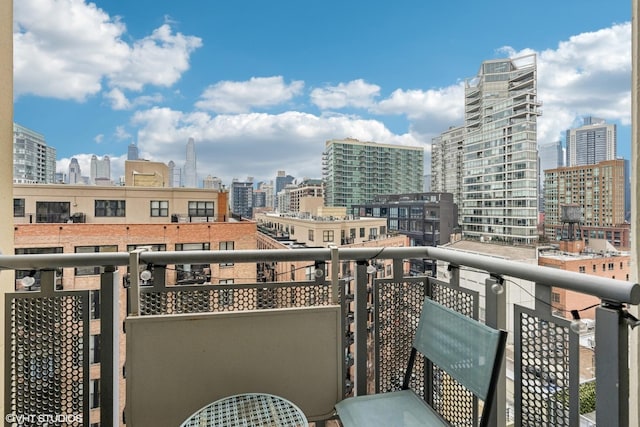 balcony featuring a city view