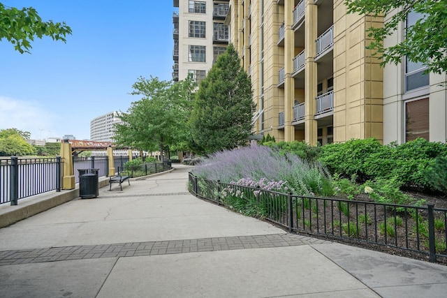 view of property's community with fence