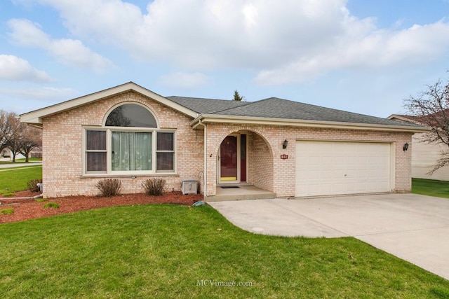 633 Mendota Ln, Romeoville, IL 60446 - ranch-style house featuring concrete driveway, a garage, a front lawn, and brick siding