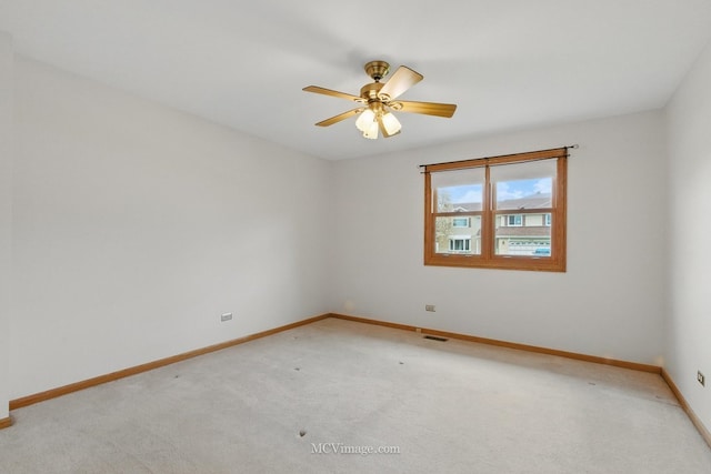 633 Mendota Ln, Romeoville, IL 60446 - unfurnished room with light carpet, ceiling fan, baseboards, and visible vents