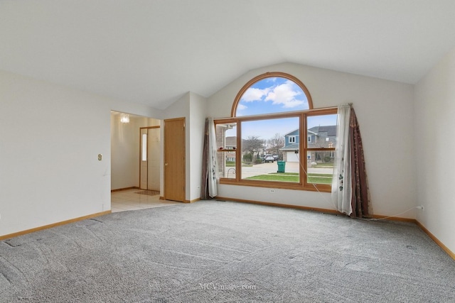 633 Mendota Ln, Romeoville, IL 60446 - unfurnished room with light colored carpet, baseboards, and lofted ceiling
