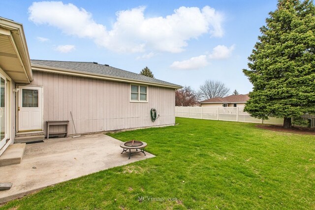 633 Mendota Ln, Romeoville, IL 60446 - view of yard featuring a patio, fence, and an outdoor fire pit