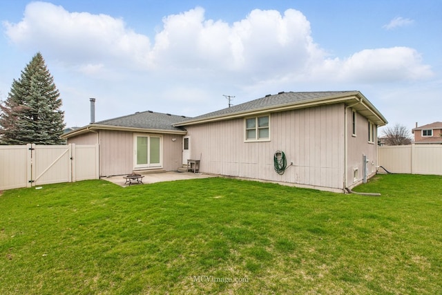 633 Mendota Ln, Romeoville, IL 60446 - rear view of house featuring a yard, a fenced backyard, a patio, and a gate