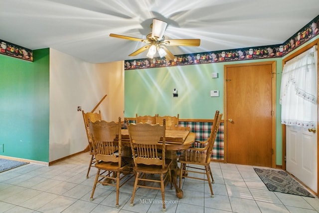 633 Mendota Ln, Romeoville, IL 60446 - dining area with ceiling fan, light tile patterned flooring, and baseboards