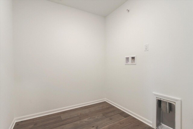 laundry room featuring washer hookup, dark wood-style flooring, baseboards, and laundry area