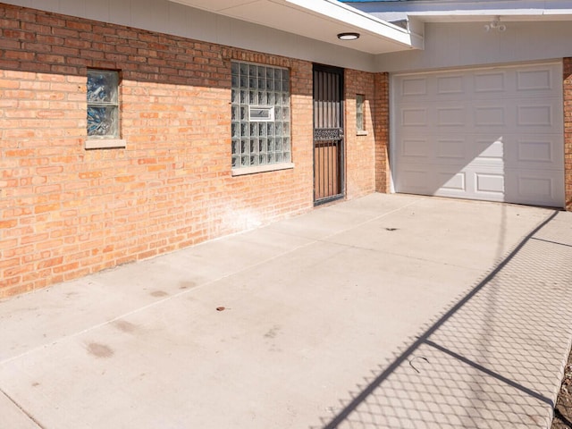 347 Madison Ave, Calumet City, IL 60409 - exterior space featuring an attached garage and concrete driveway