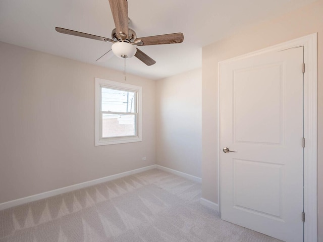 347 Madison Ave, Calumet City, IL 60409 - unfurnished room featuring light colored carpet, ceiling fan, and baseboards