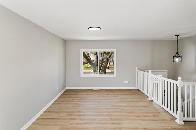 753 Rogers Rd, Romeoville, IL 60446 - empty room featuring light wood-style floors and baseboards