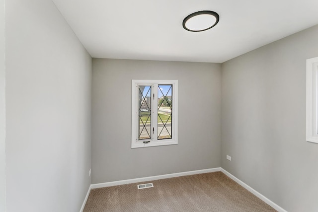 753 Rogers Rd, Romeoville, IL 60446 - carpeted spare room with baseboards and visible vents
