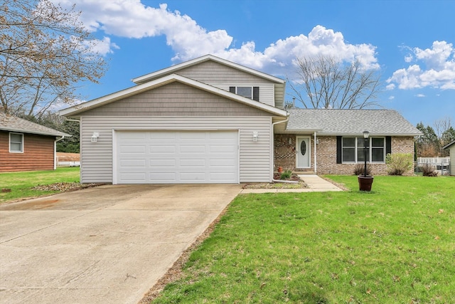 view of front of house with brick siding, a front yard, concrete driveway, and an attached garage