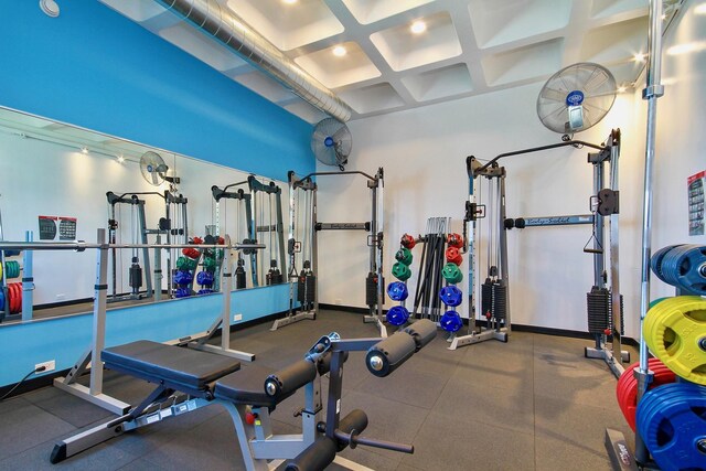 1300 N Lake Shore Dr Unit 25B, Chicago, IL 60610 - workout area featuring coffered ceiling, healthy amount of natural light, and beamed ceiling