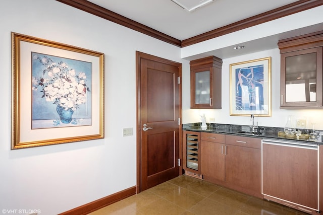 1300 N Lake Shore Dr Unit 25B, Chicago, IL 60610 - indoor wet bar with beverage cooler, crown molding, and baseboards