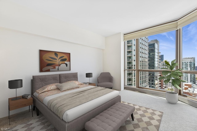 21 E Huron St Unit 1806, Chicago, IL 60611 - bedroom with a view of city, expansive windows, and carpet floors