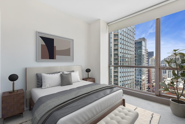 21 E Huron St Unit 1806, Chicago, IL 60611 - bedroom with a city view, carpet floors, and floor to ceiling windows