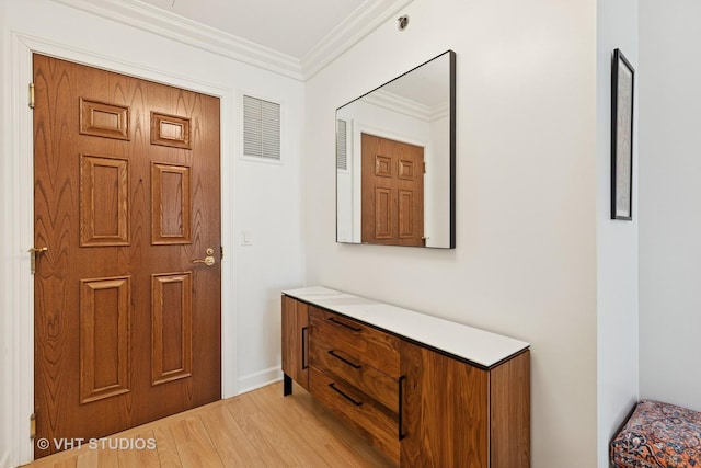 21 E Huron St Unit 1806, Chicago, IL 60611 - entryway with light wood-style flooring, ornamental molding, and baseboards