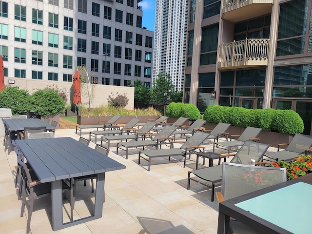 21 E Huron St Unit 1806, Chicago, IL 60611 - view of property's community with outdoor dining area and a city view