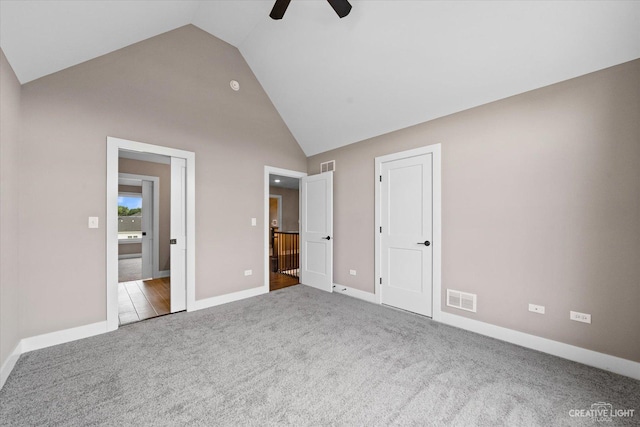 483 Deerfield Dr, Oswego, IL 60543 - unfurnished bedroom with baseboards, carpet flooring, high vaulted ceiling, and visible vents