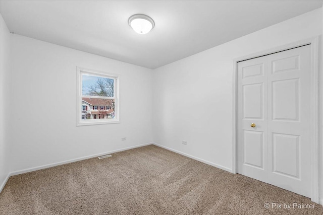 413 Edinburgh Ln, West Dundee, IL 60118 - carpeted spare room featuring visible vents and baseboards