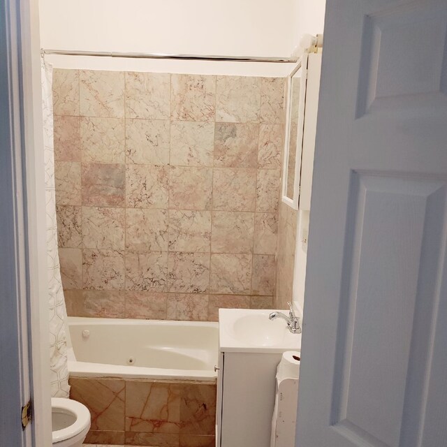 3921 W Huron St Unit 3, Chicago, IL 60624 - full bathroom with toilet, vanity, and tiled shower / bath
