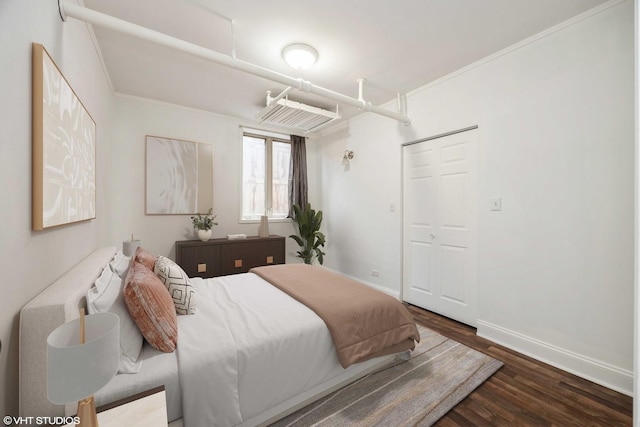 7001 W Altgeld St Unit G, Chicago, IL 60707 - bedroom with wood finished floors, baseboards, and crown molding