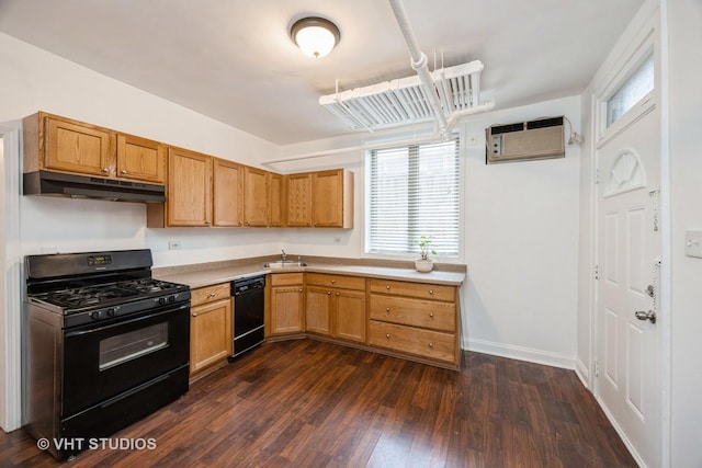 7001 W Altgeld St Unit G, Chicago, IL 60707 - kitchen featuring black appliances, under cabinet range hood, a wall mounted air conditioner, light countertops, and dark wood-style floors