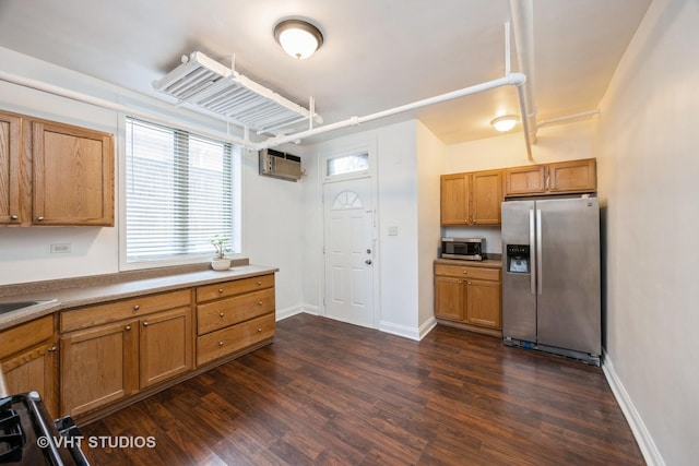 7001 W Altgeld St Unit G, Chicago, IL 60707 - kitchen featuring stainless steel appliances, dark wood-style flooring, a wall mounted AC, and brown cabinetry