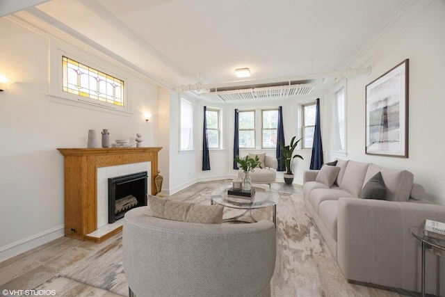 7001 W Altgeld St Unit G, Chicago, IL 60707 - living area with ornamental molding, a tile fireplace, and baseboards