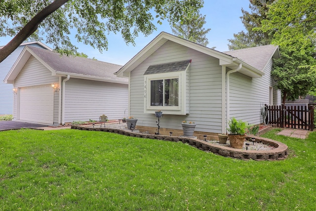 1456 Bangor Ln, Aurora, IL 60504 - view of front of home featuring an attached garage, driveway, and a shingled roof