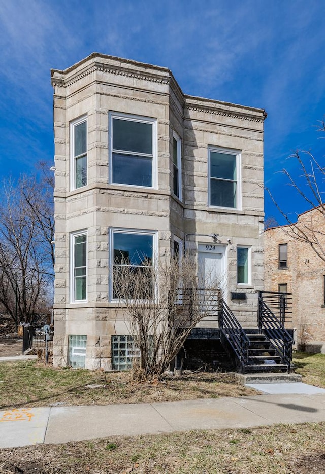 view of front facade with stone siding