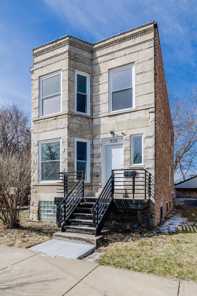 view of front facade with stone siding