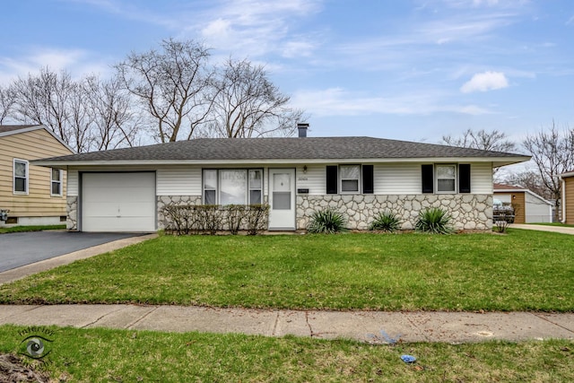 22426 Yates Ave, Sauk Village, IL 60411 - ranch-style house featuring stone siding, an attached garage, a front lawn, roof with shingles, and driveway