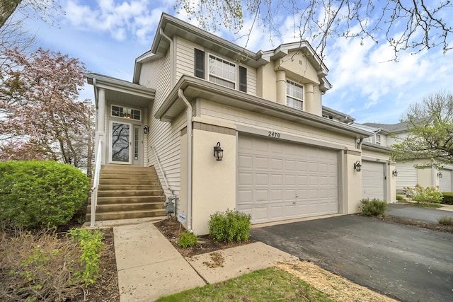 2470 Palazzo Ct, Buffalo Grove, IL 60089 - view of front of property featuring aphalt driveway and a garage