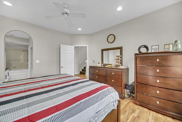 2470 Palazzo Ct, Buffalo Grove, IL 60089 - bedroom featuring recessed lighting, arched walkways, light wood finished floors, and a ceiling fan