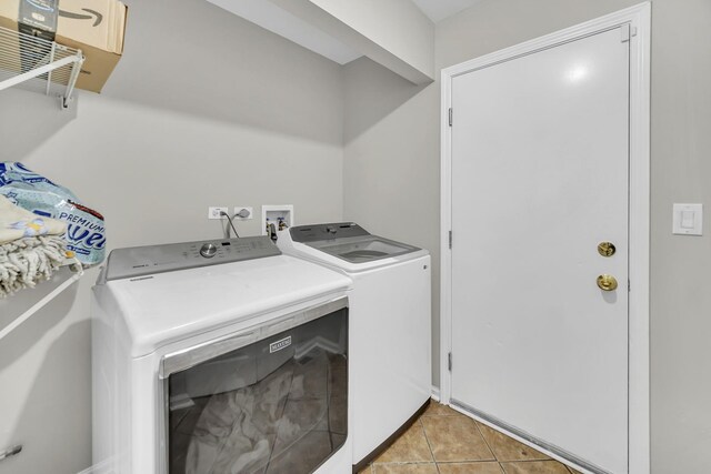 2470 Palazzo Ct, Buffalo Grove, IL 60089 - washroom featuring light tile patterned floors and washer and clothes dryer
