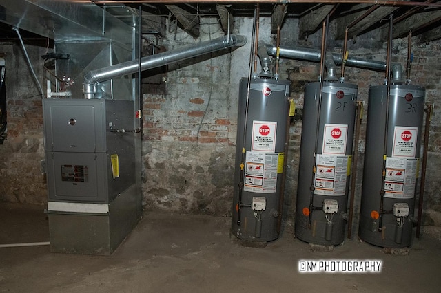 2152 W 19th St, Chicago, IL 60608 - utility room with water heater and heating unit