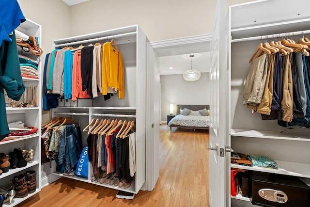 5486 S Woodlawn Ave Unit 3, Chicago, IL 60615 - spacious closet featuring wood finished floors