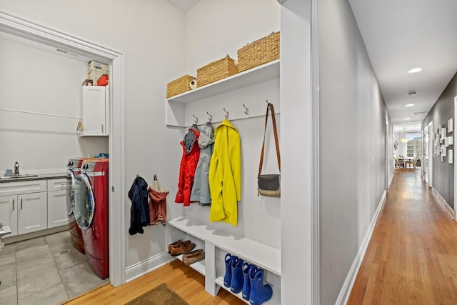 5486 S Woodlawn Ave Unit 3, Chicago, IL 60615 - mudroom featuring light wood finished floors, baseboards, and a sink