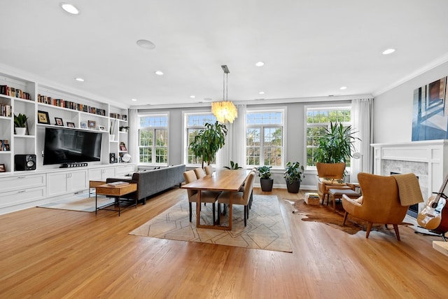5486 S Woodlawn Ave Unit 3, Chicago, IL 60615 - dining area featuring recessed lighting, crown molding, a fireplace, and light wood-type flooring