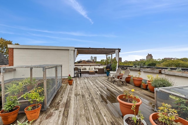 5486 S Woodlawn Ave Unit 3, Chicago, IL 60615 - deck with an outdoor living space, central AC, and a city view