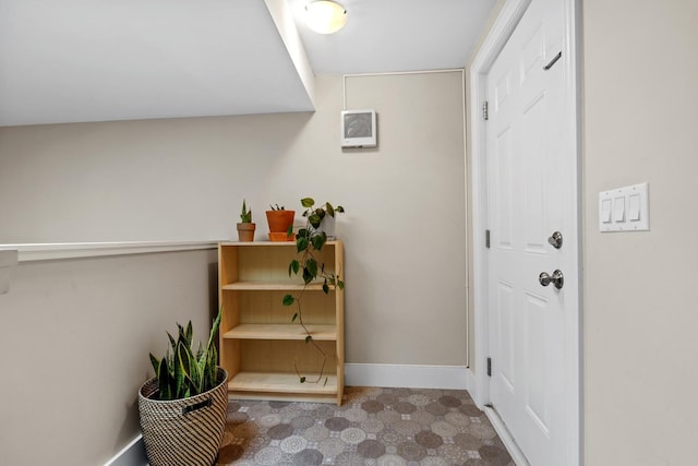 5486 S Woodlawn Ave Unit 3, Chicago, IL 60615 - interior space featuring baseboards and tile patterned floors