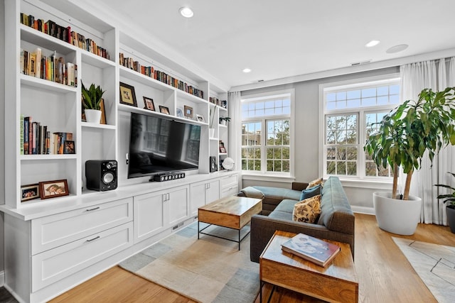5486 S Woodlawn Ave Unit 3, Chicago, IL 60615 - living room with light wood-style flooring and recessed lighting