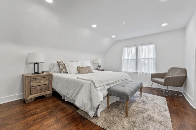 bedroom featuring baseboards, recessed lighting, vaulted ceiling, and dark wood-style floors