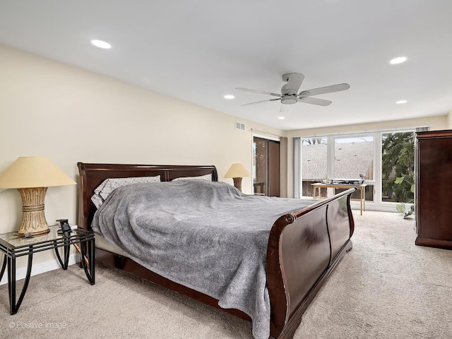 bedroom with recessed lighting, visible vents, and light colored carpet