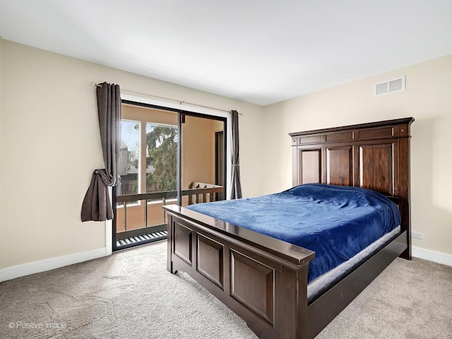 bedroom featuring light carpet, baseboards, and visible vents